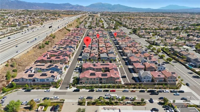 an aerial view of residential building with parking space