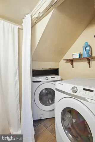 a utility room with dryer and washer