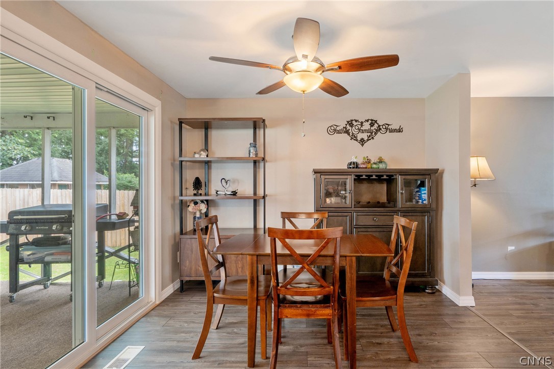 4346 Old Meadow Road Clay, NY 13041 - Photo 7 of 33 Also quite bright and welcoming, the dining room c
