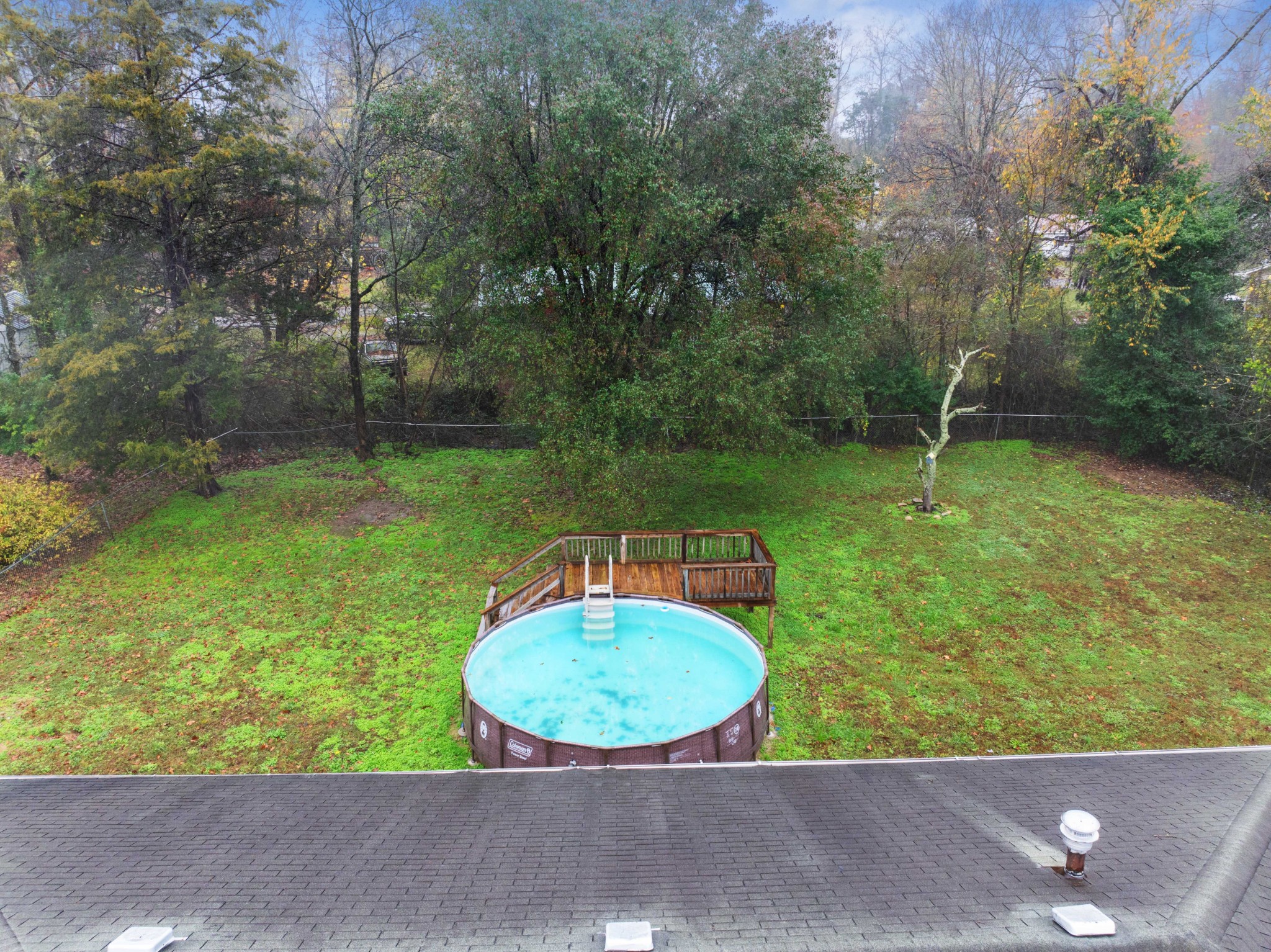 112 Brookside Drive Linden, TN 37096 - Photo 14 of 17 a view of a backyard with a swimming pool
