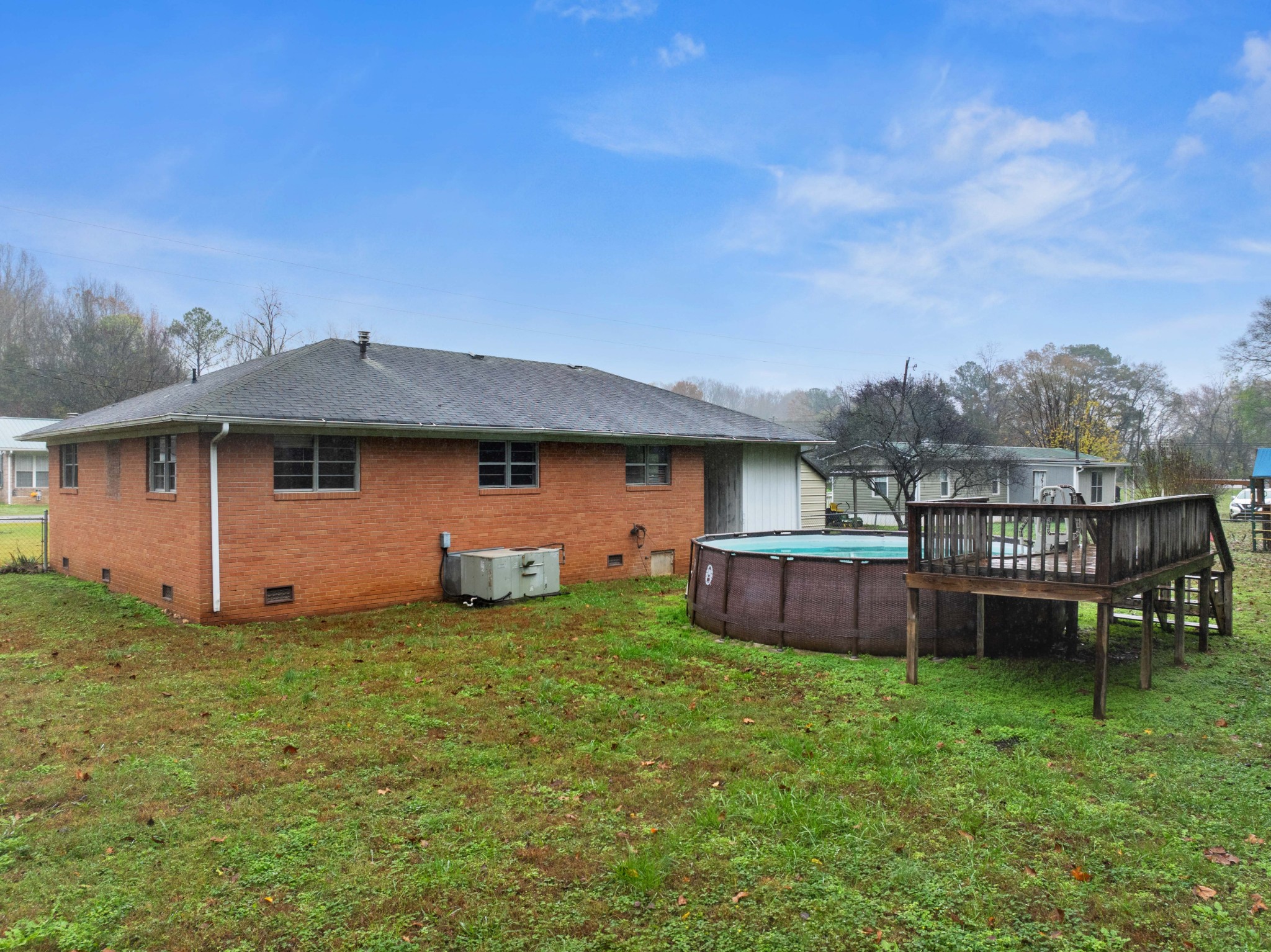 112 Brookside Drive Linden, TN 37096 - Photo 15 of 17 a view of a house with a yard and sitting area