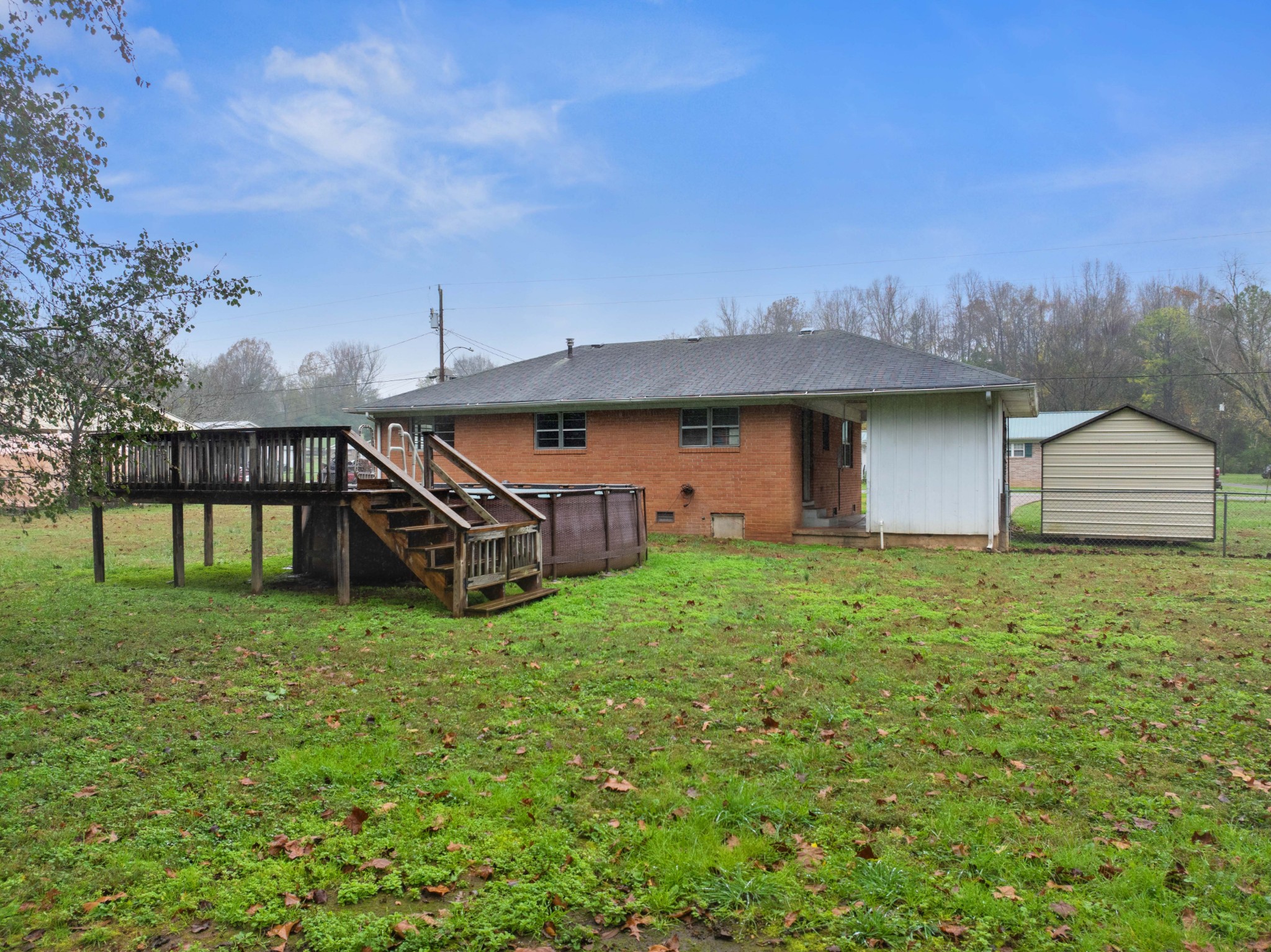 112 Brookside Drive Linden, TN 37096 - Photo 16 of 17 a front view of a house with garden