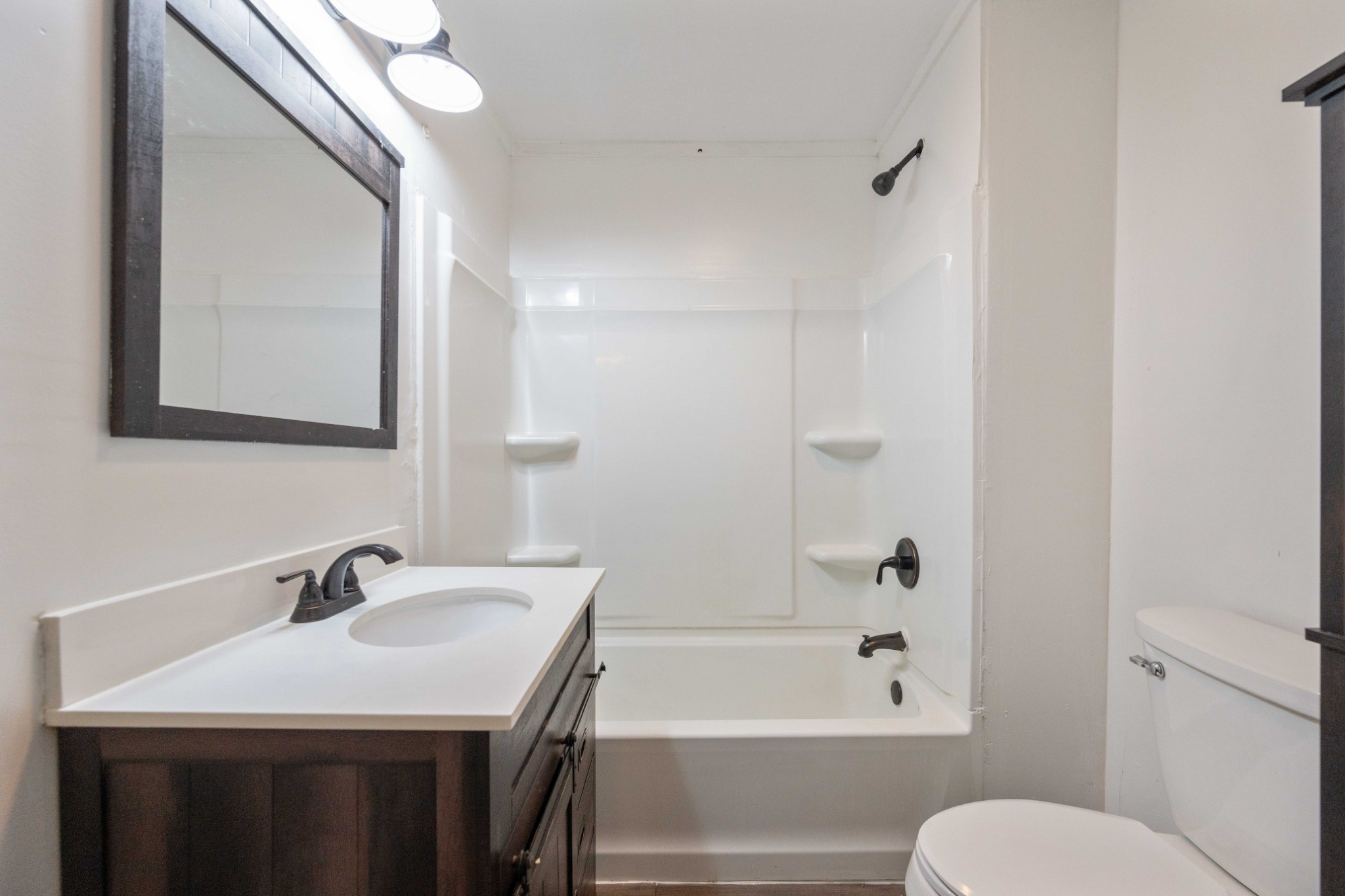 112 Brookside Drive Linden, TN 37096 - Photo 7 of 17 a bathroom with a sink toilet and shower