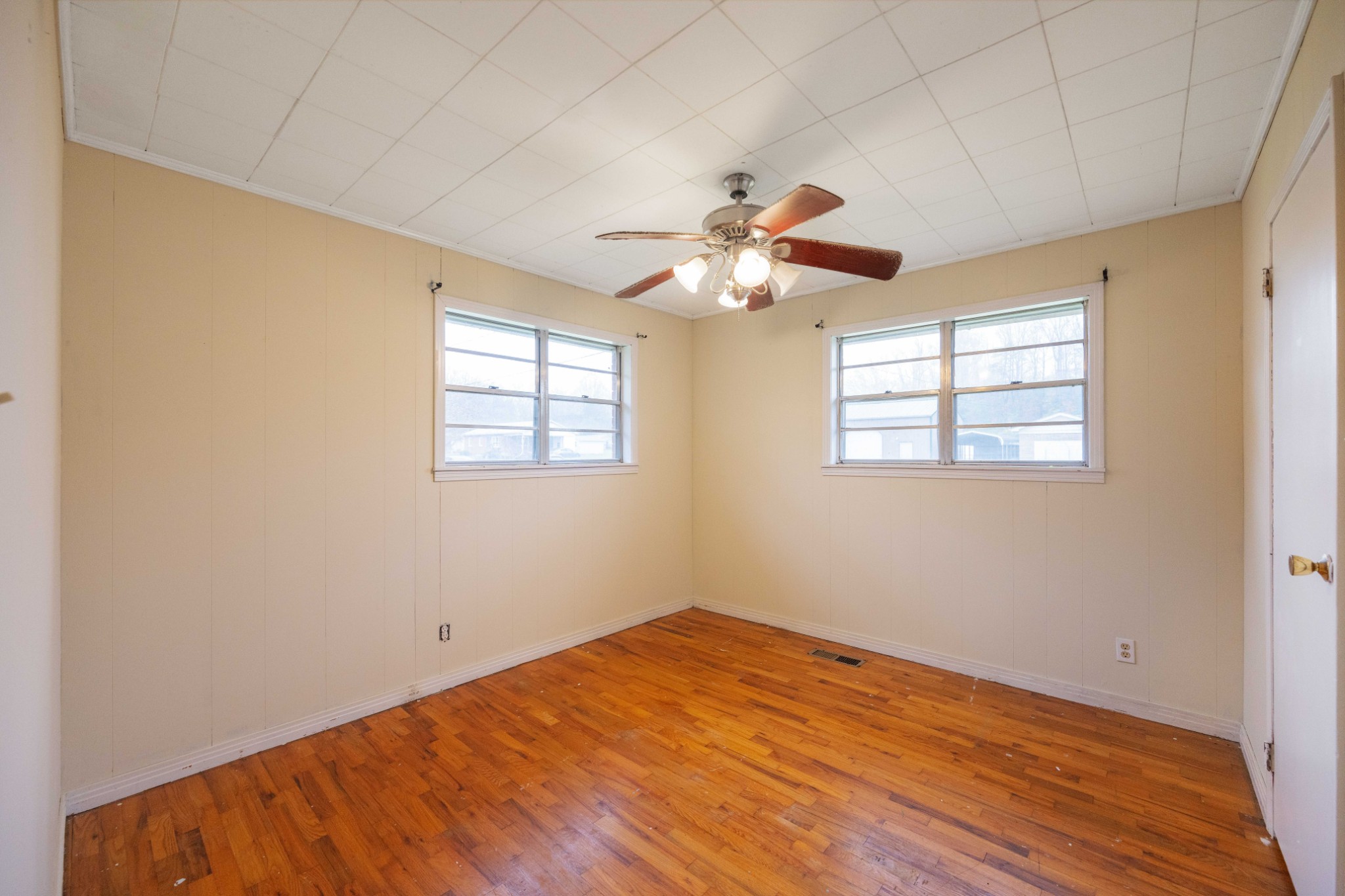 112 Brookside Drive Linden, TN 37096 - Photo 9 of 17 an empty room with windows and fan