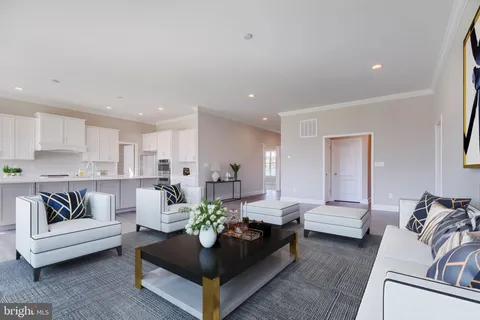 a living room with furniture and a couch