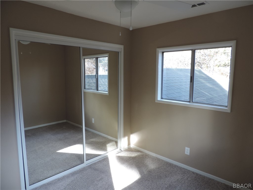 403 Riverside Avenue Sugarloaf, CA 92386 - Photo 20 of 30 a view of livingroom with window