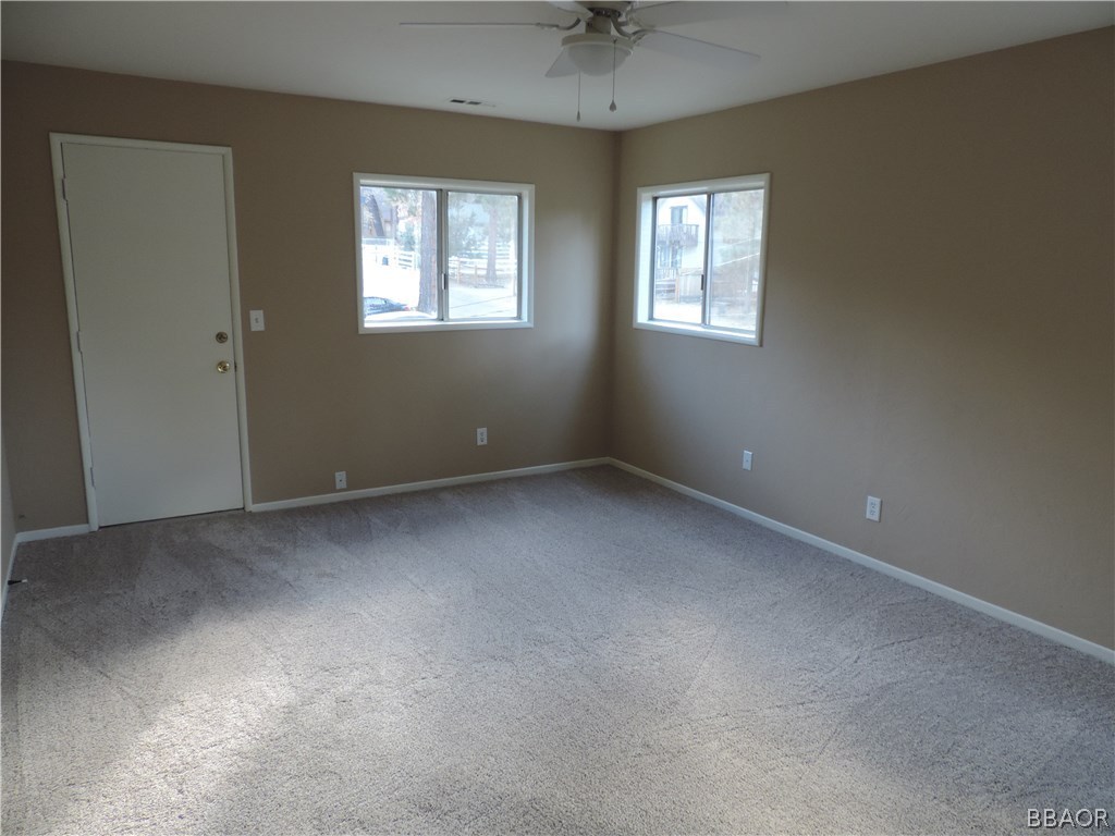 403 Riverside Avenue Sugarloaf, CA 92386 - Photo 23 of 30 an empty room with a window