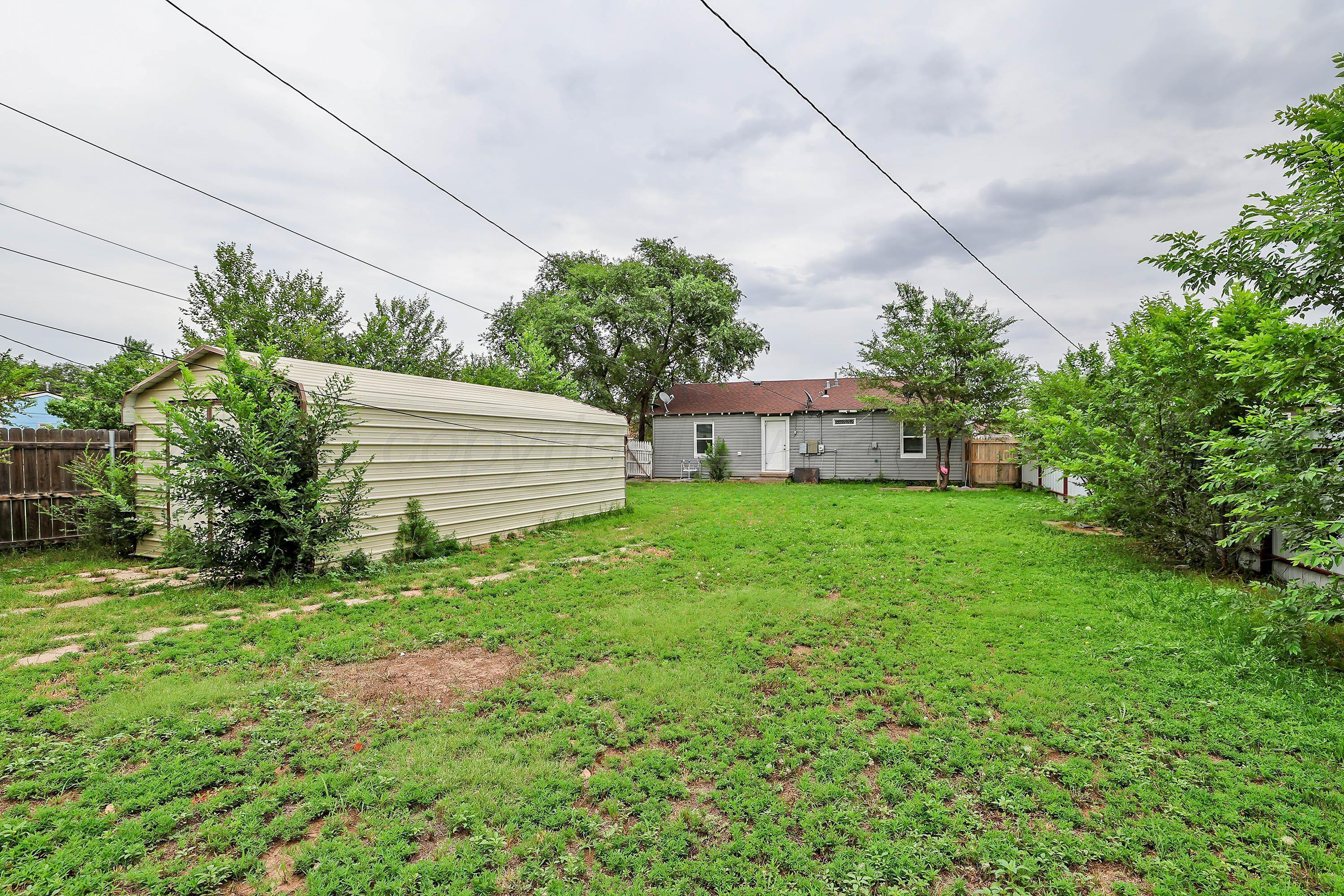 4112 South Tyler Street Amarillo, TX 79110 - Photo 19 of 20 a front view of house with garden