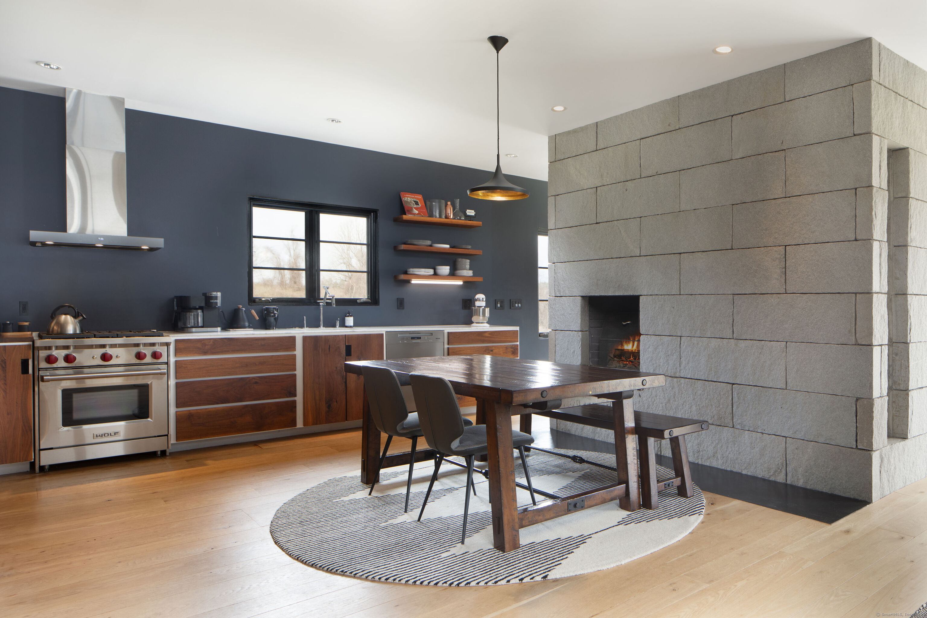 120 Lime Rock Road Salisbury, CT 06039 - Photo 13 of 35 a dining room with a table and chairs