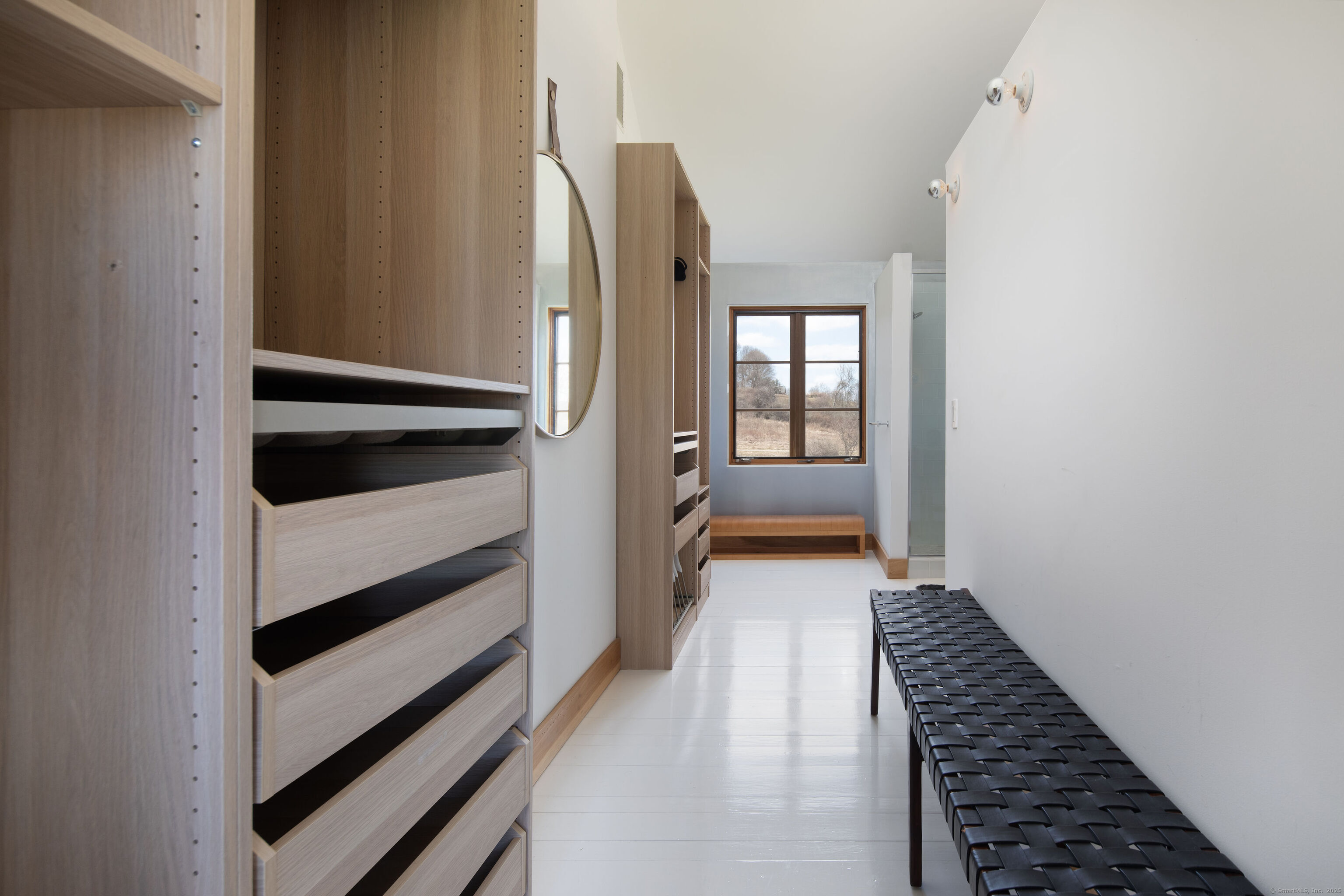 120 Lime Rock Road Salisbury, CT 06039 - Photo 19 of 35 a view of a hallway with wooden floor and staircase