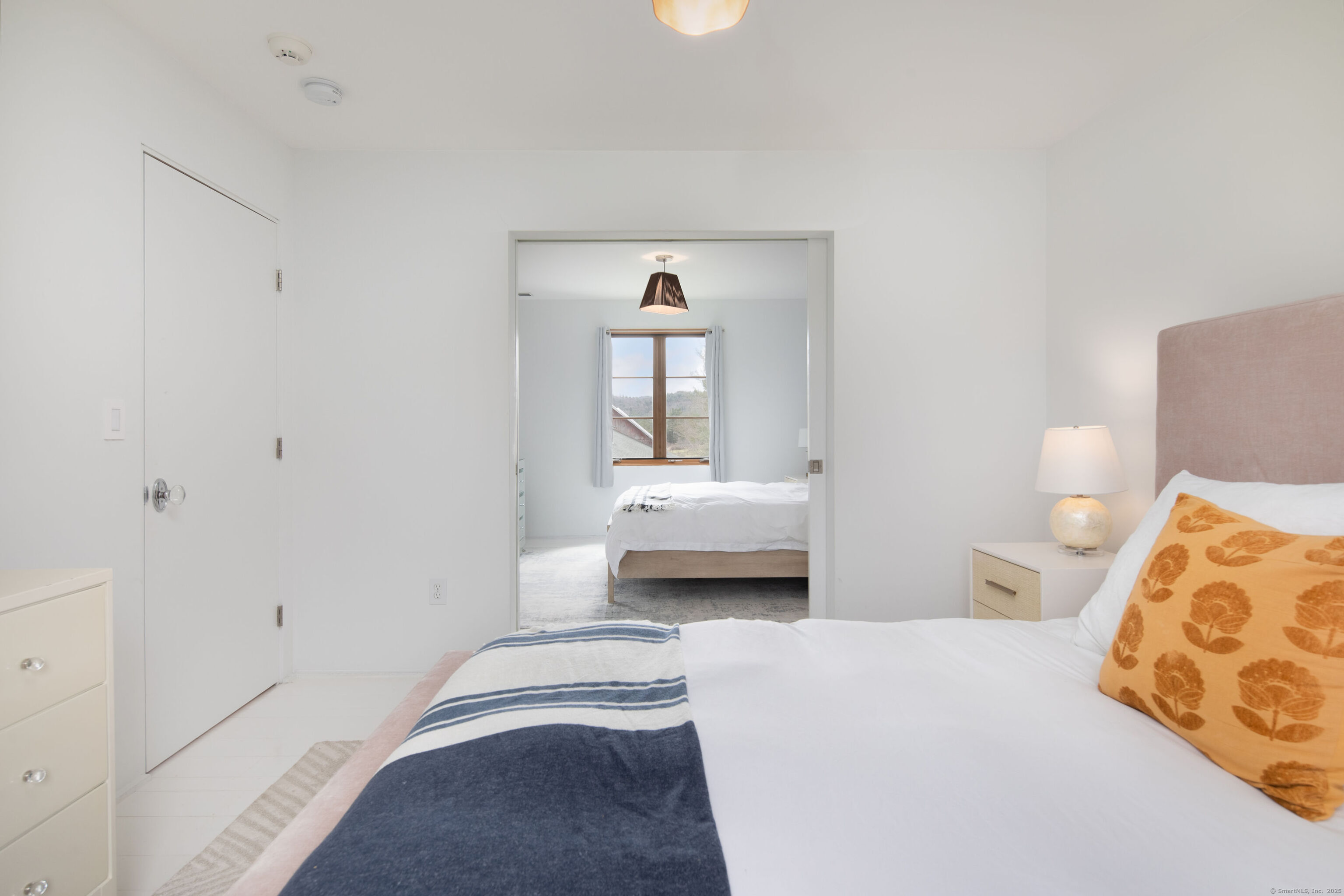 120 Lime Rock Road Salisbury, CT 06039 - Photo 21 of 35 a bedroom with a bed and a window