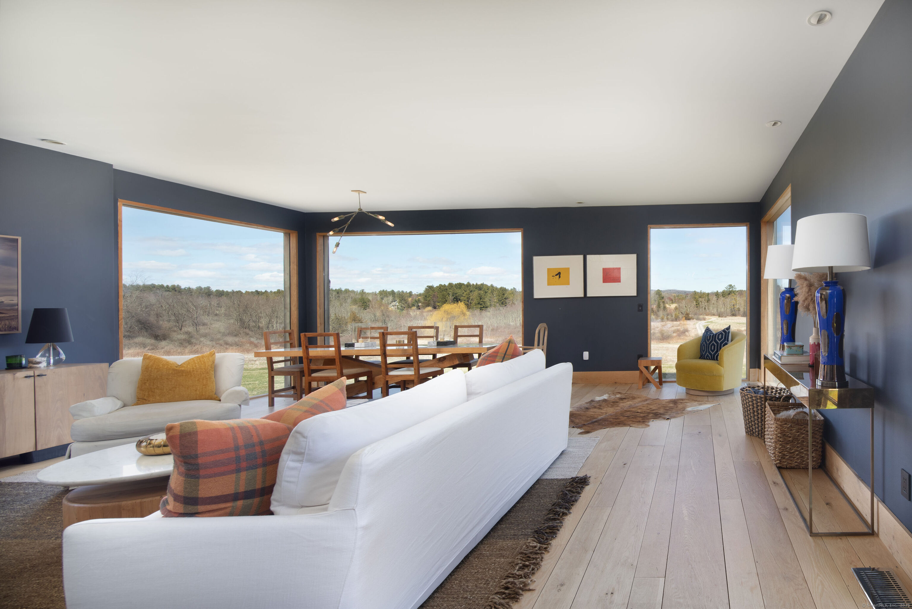 120 Lime Rock Road Salisbury, CT 06039 - Photo 3 of 35 a living room with furniture and a large window