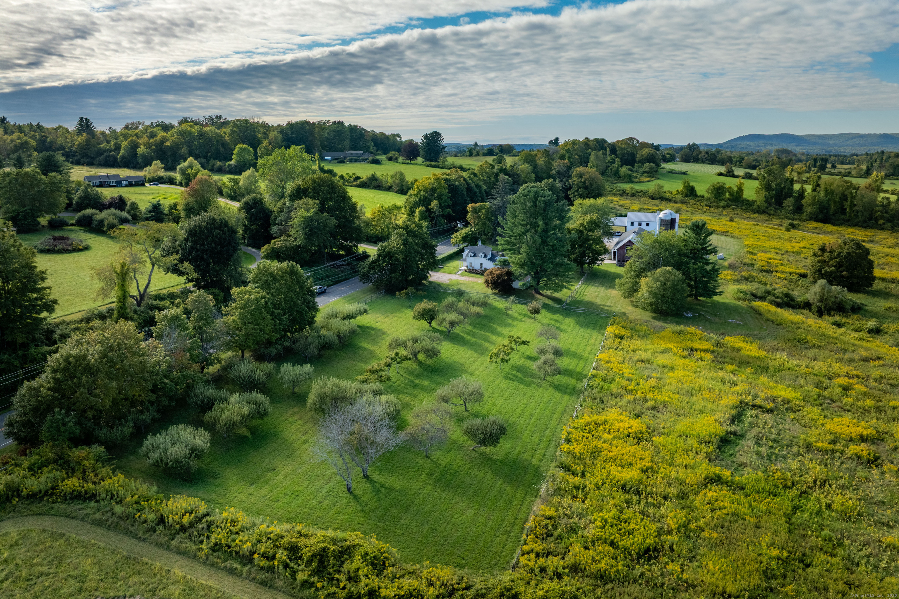 120 Lime Rock Road Salisbury, CT 06039 - Photo 35 of 35 a view of a garden with a lake