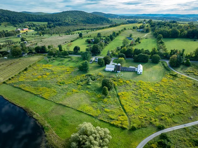 a view of a lake with a yard