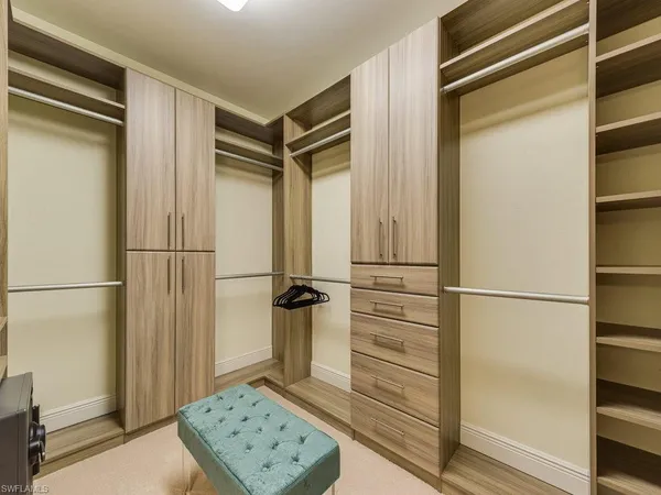 a view of a balcony with furniture