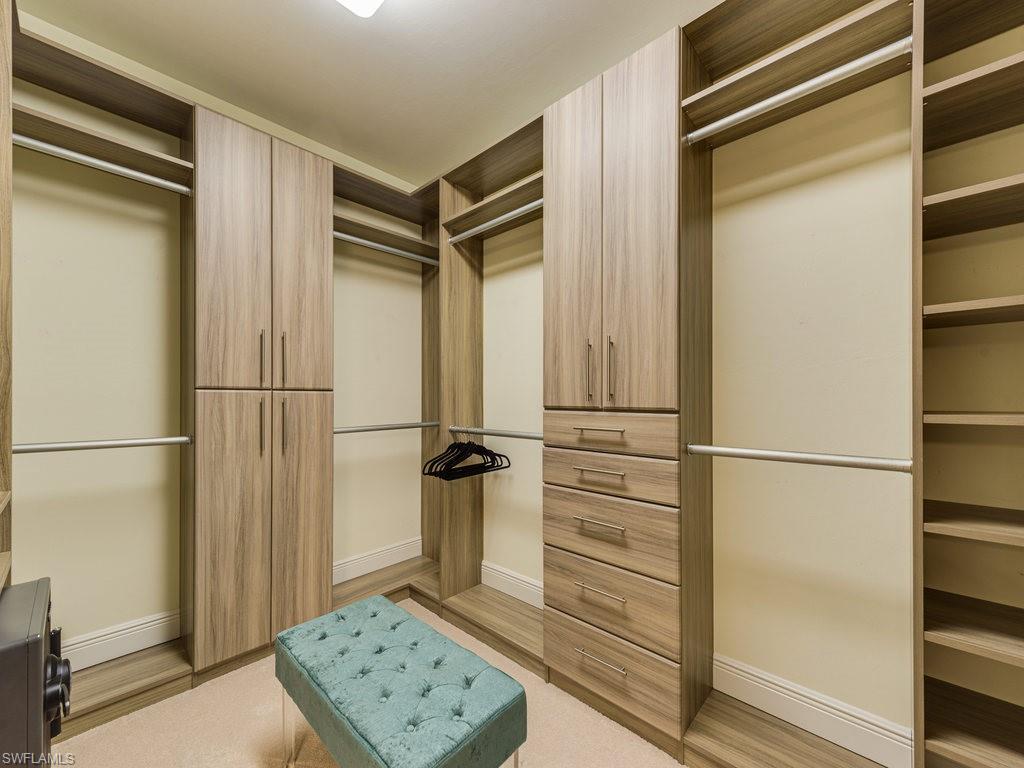 16425 Carrara Way, Unit 101 Naples, FL 34110 - Photo 17 of 21 a view of walk in closet