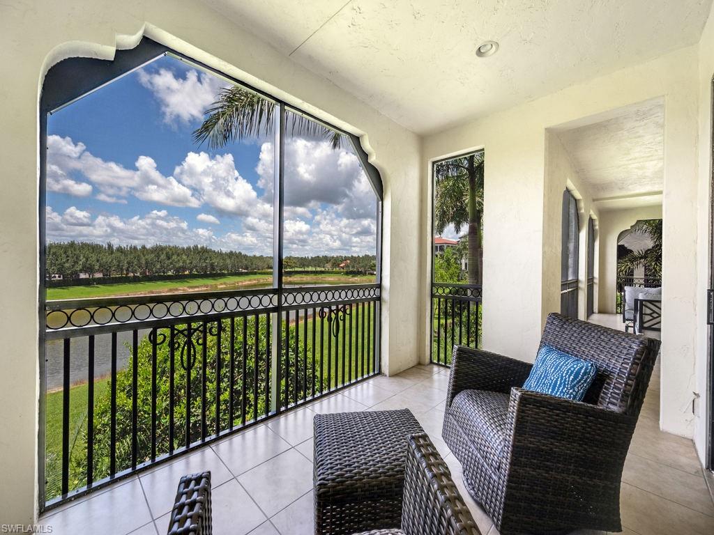 16425 Carrara Way, Unit 101 Naples, FL 34110 - Photo 18 of 21 a view of a balcony with furniture