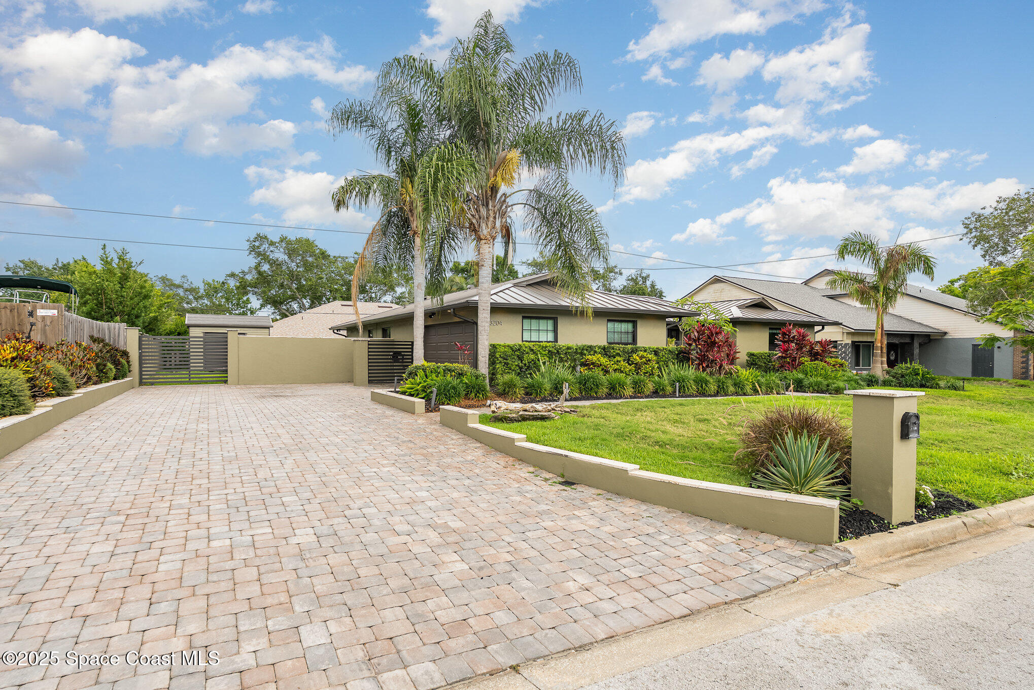 3204 Nottingham Lane Cocoa, FL 32926 - Photo 5 of 36 a front view of house with yard and green space