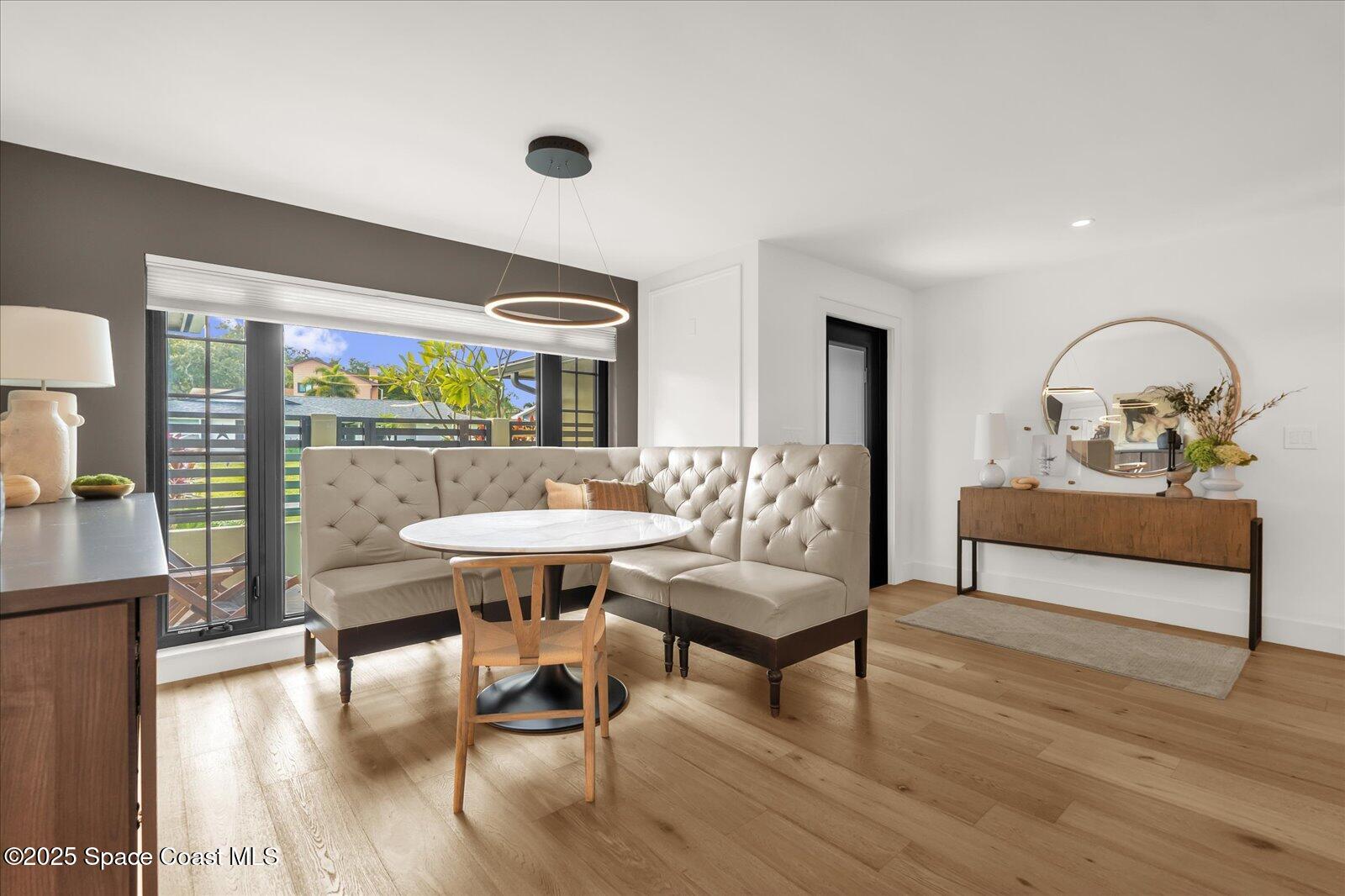 3204 Nottingham Lane Cocoa, FL 32926 - Photo 9 of 36 a living room with furniture and wooden floor