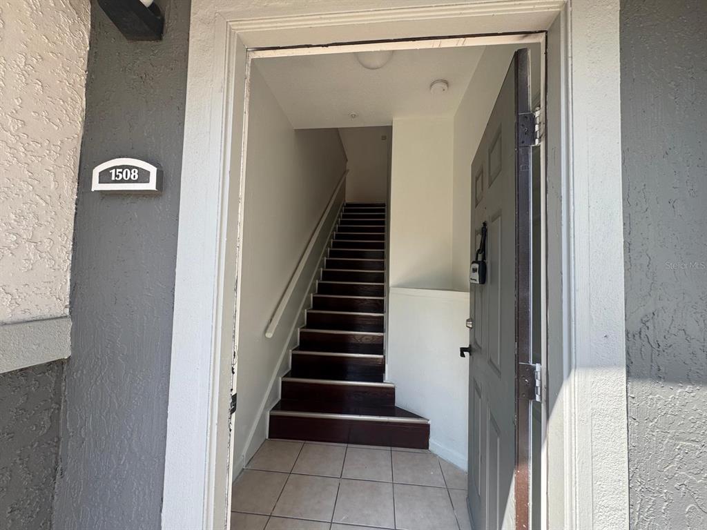 4320 South Kirkman Road, Unit 1508 Orlando, FL 32811 - Photo 3 of 25 a view of entryway and hall with a wooden floor