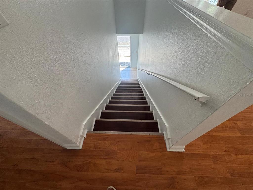4320 South Kirkman Road, Unit 1508 Orlando, FL 32811 - Photo 4 of 25 a view of entryway and hall with wooden floor