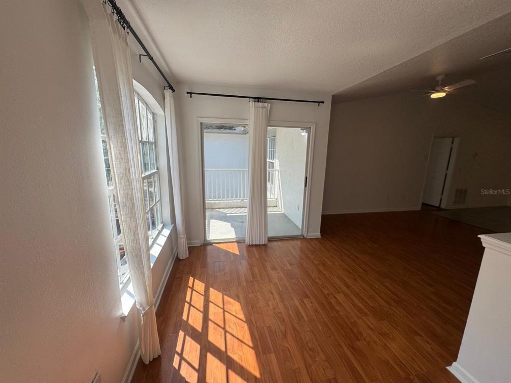 4320 South Kirkman Road, Unit 1508 Orlando, FL 32811 - Photo 7 of 25 a view of entryway with wooden floor