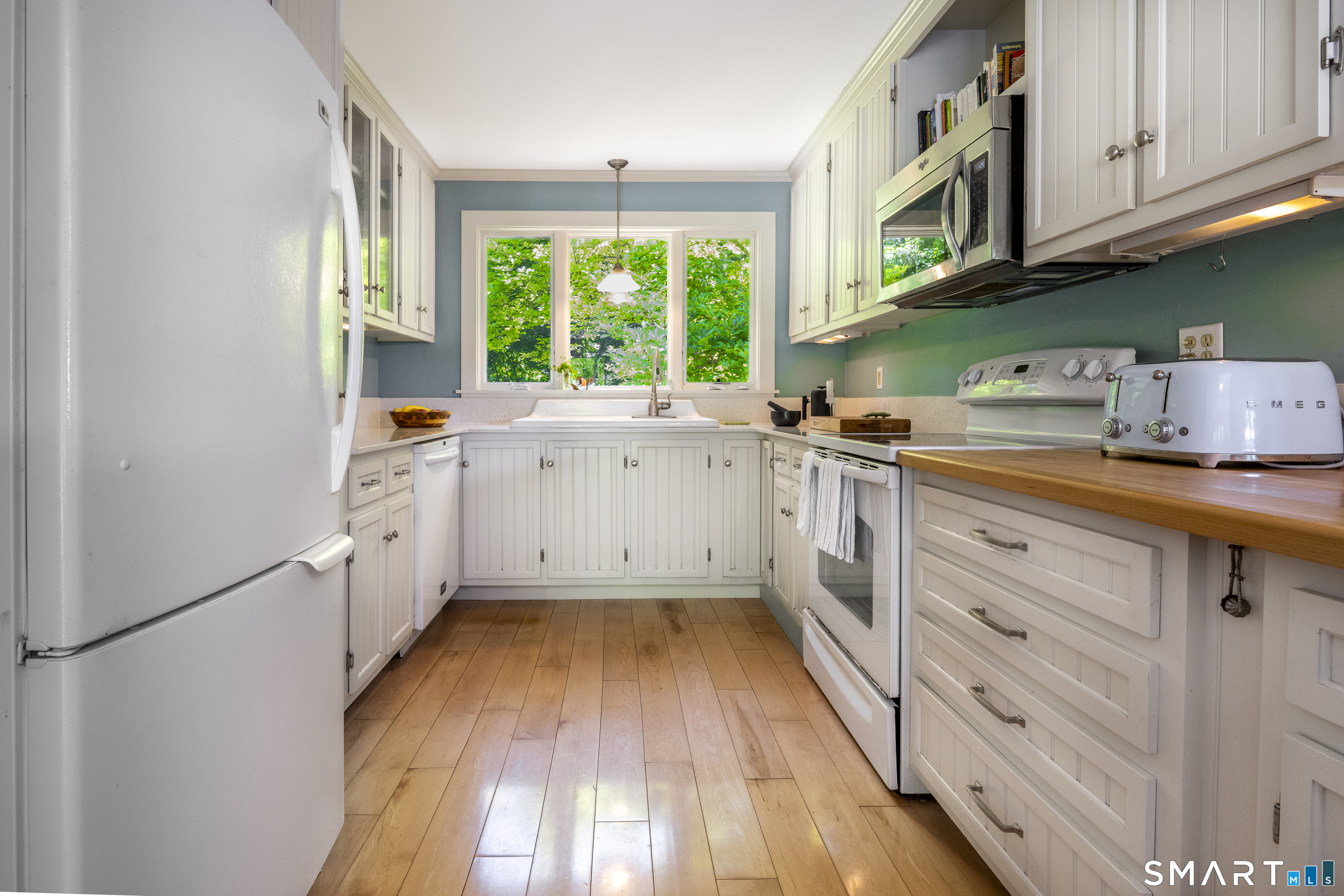 7 Chimney Rock Road Kent, CT 06757 - Photo 14 of 35 a kitchen with a sink a window and cabinets