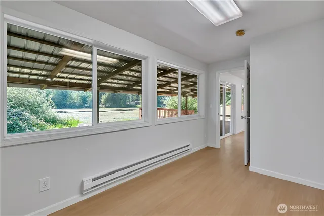 a view of an empty room with a window