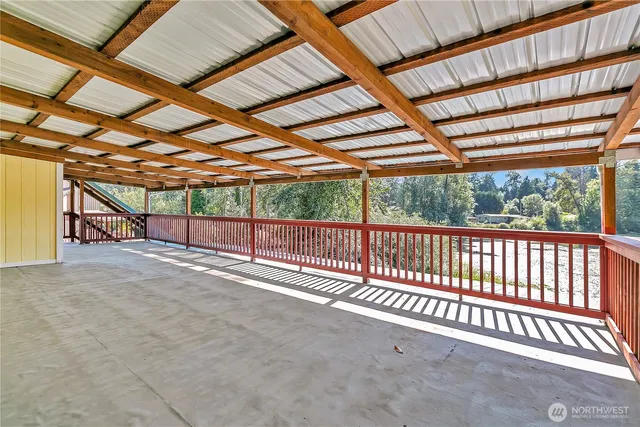a view of outdoor space with wooden deck