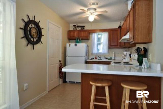 1719 Jackson Court Gulf Shores, AL 36542 - Photo 10 of 17 Kitchen Area