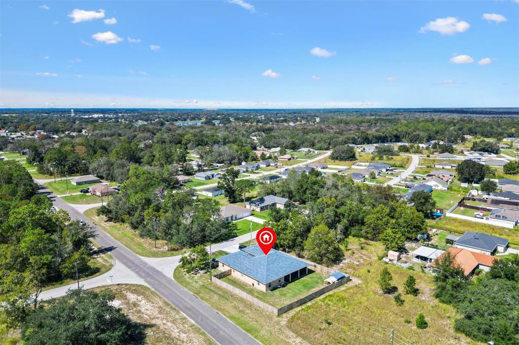 227 Locust Pass Course Ocala, FL 34472 - Photo 41 of 41 an aerial view of residential houses with outdoor space