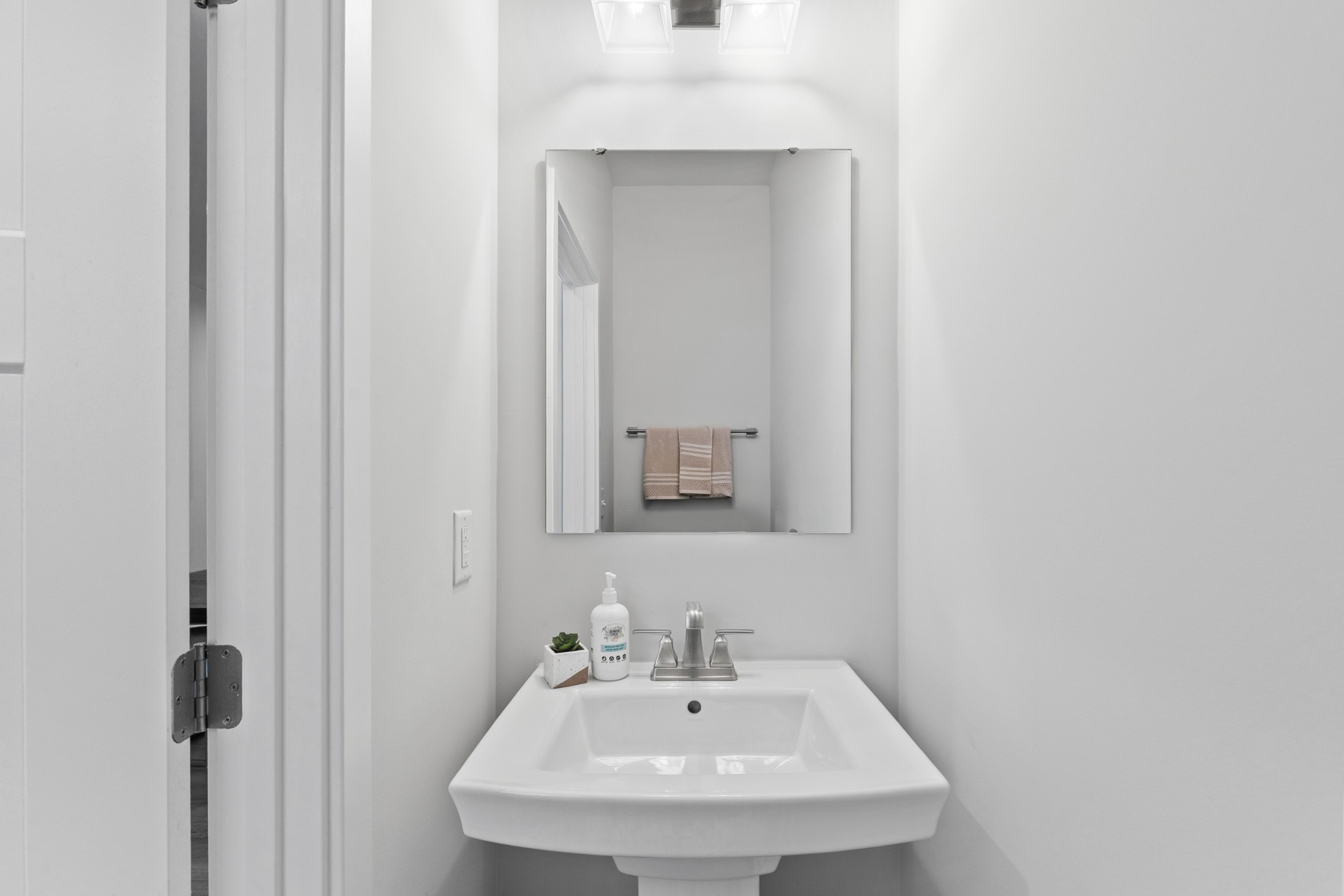 203 Pitchfork Way Gallatin, TN 37066 - Photo 8 of 39 a bathroom with a sink and a mirror