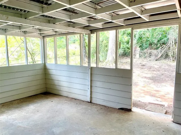 an empty room with windows