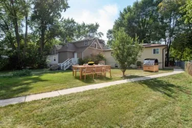 a garden view with a seating space
