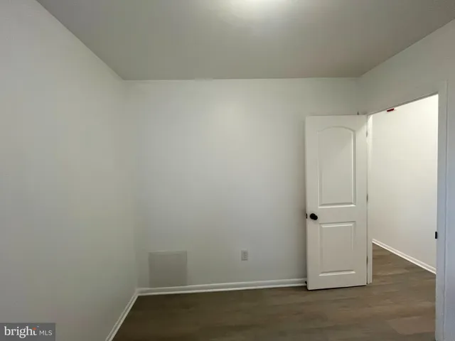 an empty room with sliding door