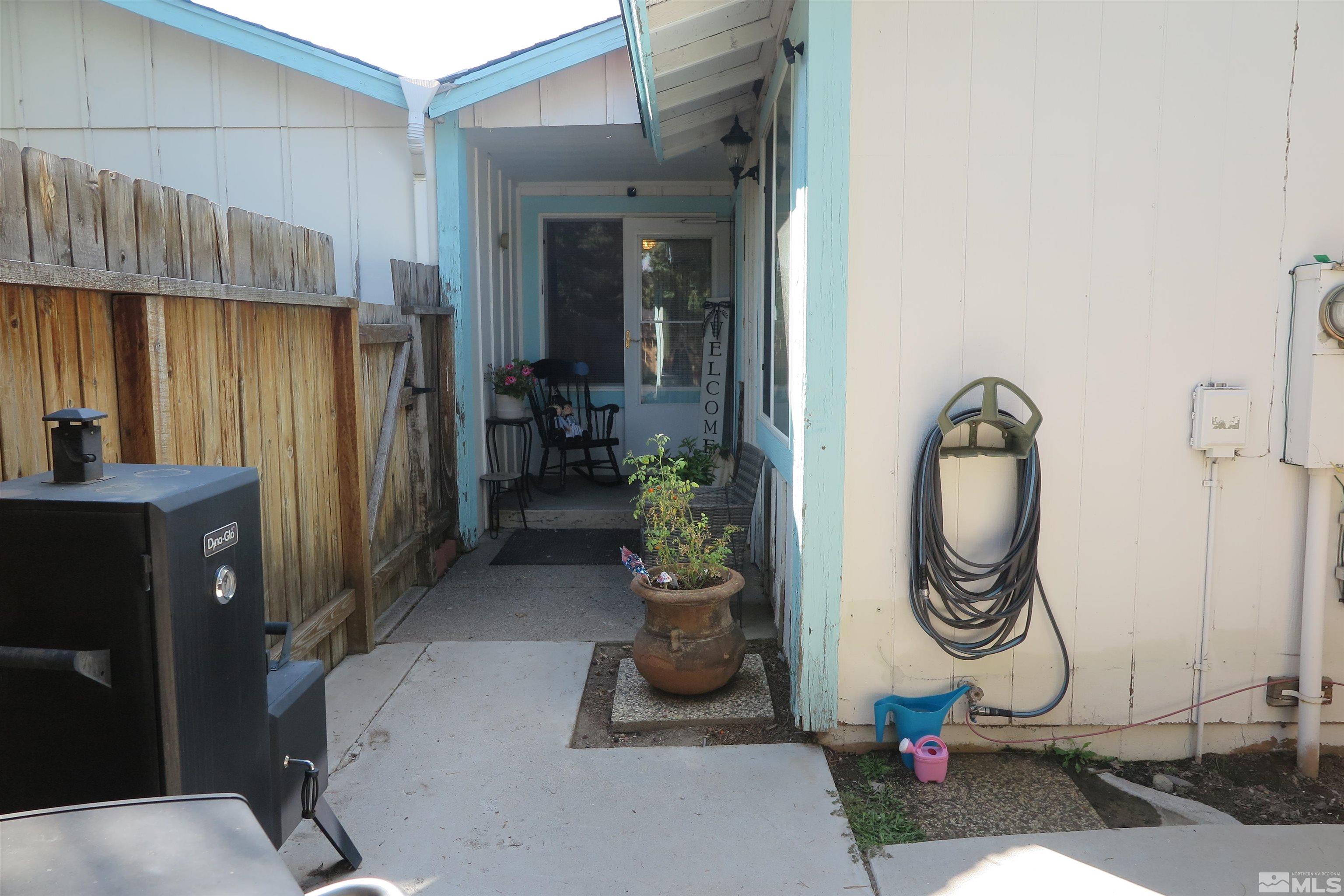 6825 Flower Street Reno, NV 89506 - Photo 11 of 35 a room with gym equipment and a mirror