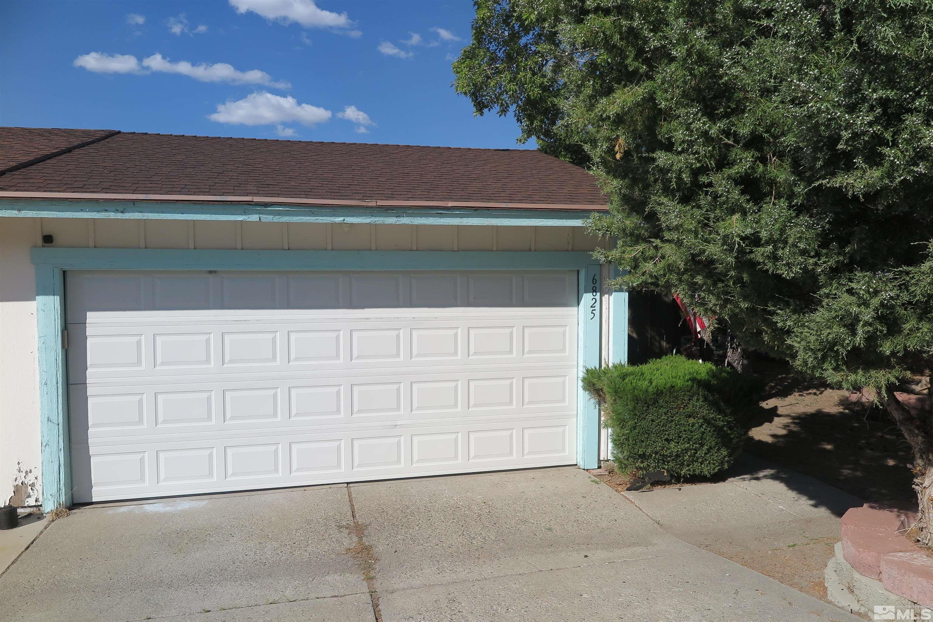 6825 Flower Street Reno, NV 89506 - Photo 2 of 35 a backyard of a house