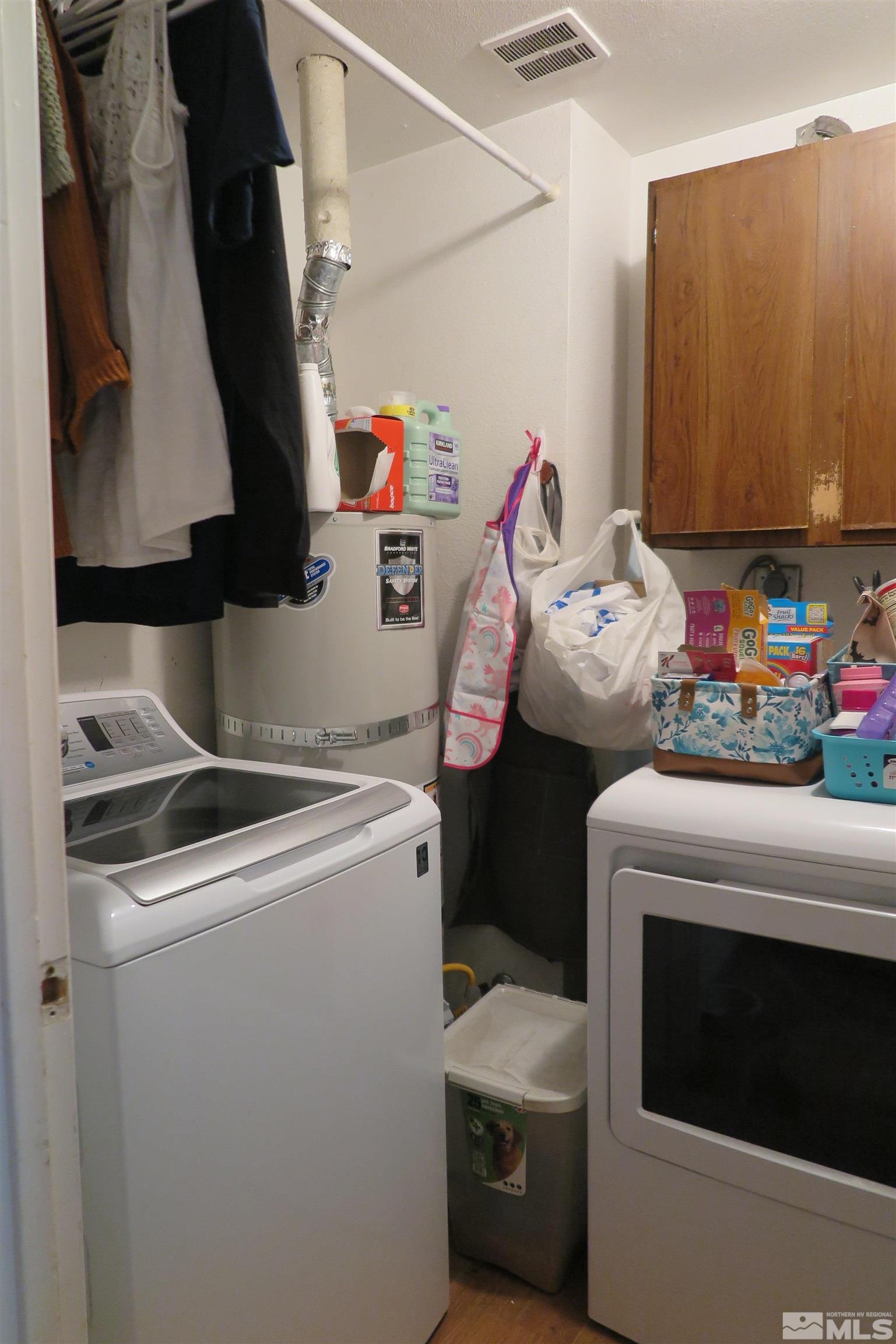 6825 Flower Street Reno, NV 89506 - Photo 22 of 35 a utility room with dryer and washer