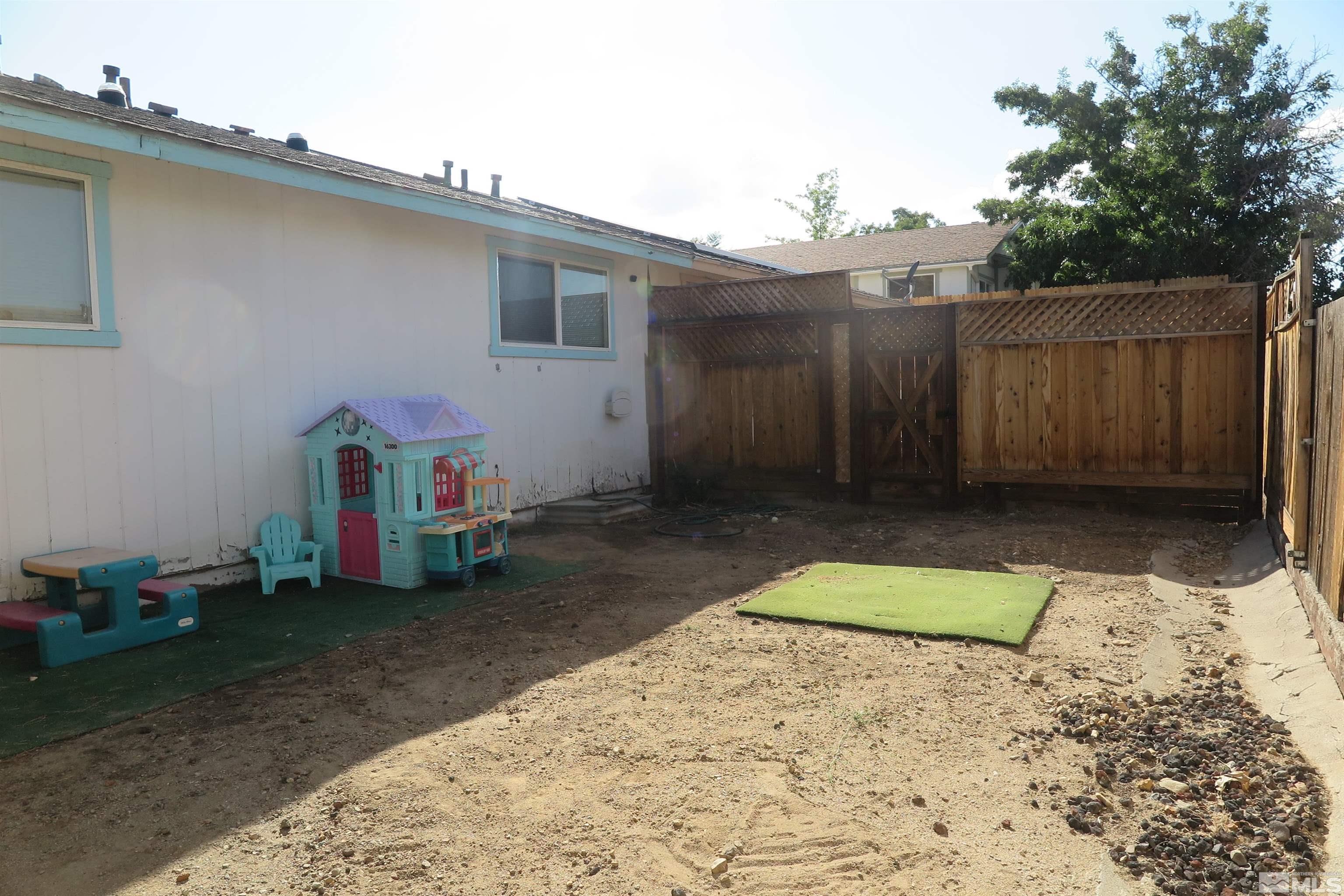 6825 Flower Street Reno, NV 89506 - Photo 32 of 35 a backyard of a house