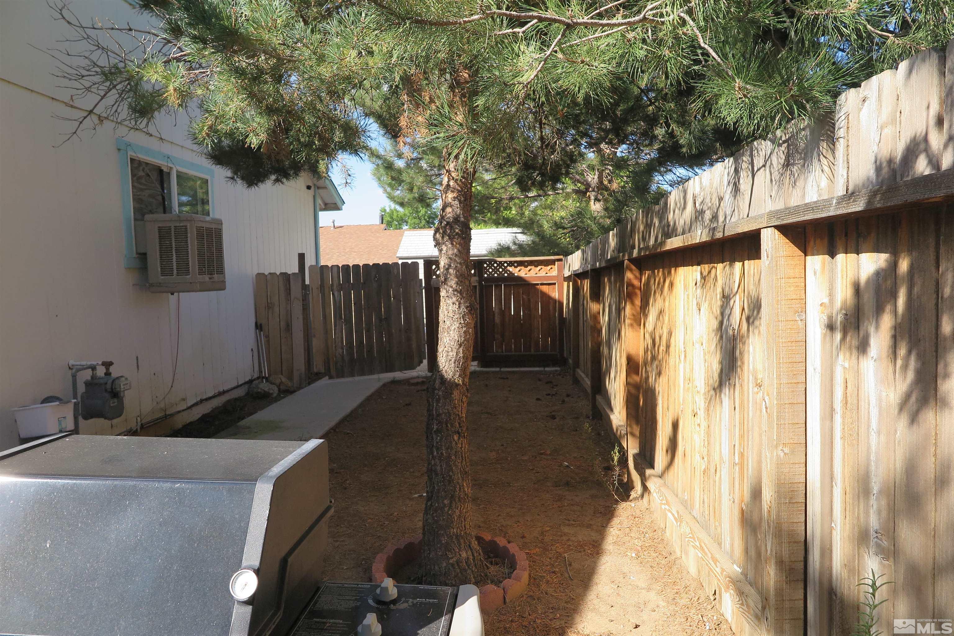 6825 Flower Street Reno, NV 89506 - Photo 8 of 35 a backyard of a house