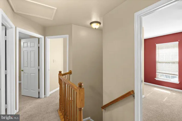 a bathroom with a sink mirror toilet and bathtub