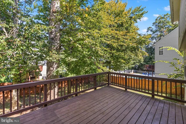 a view of a bench in a backyard