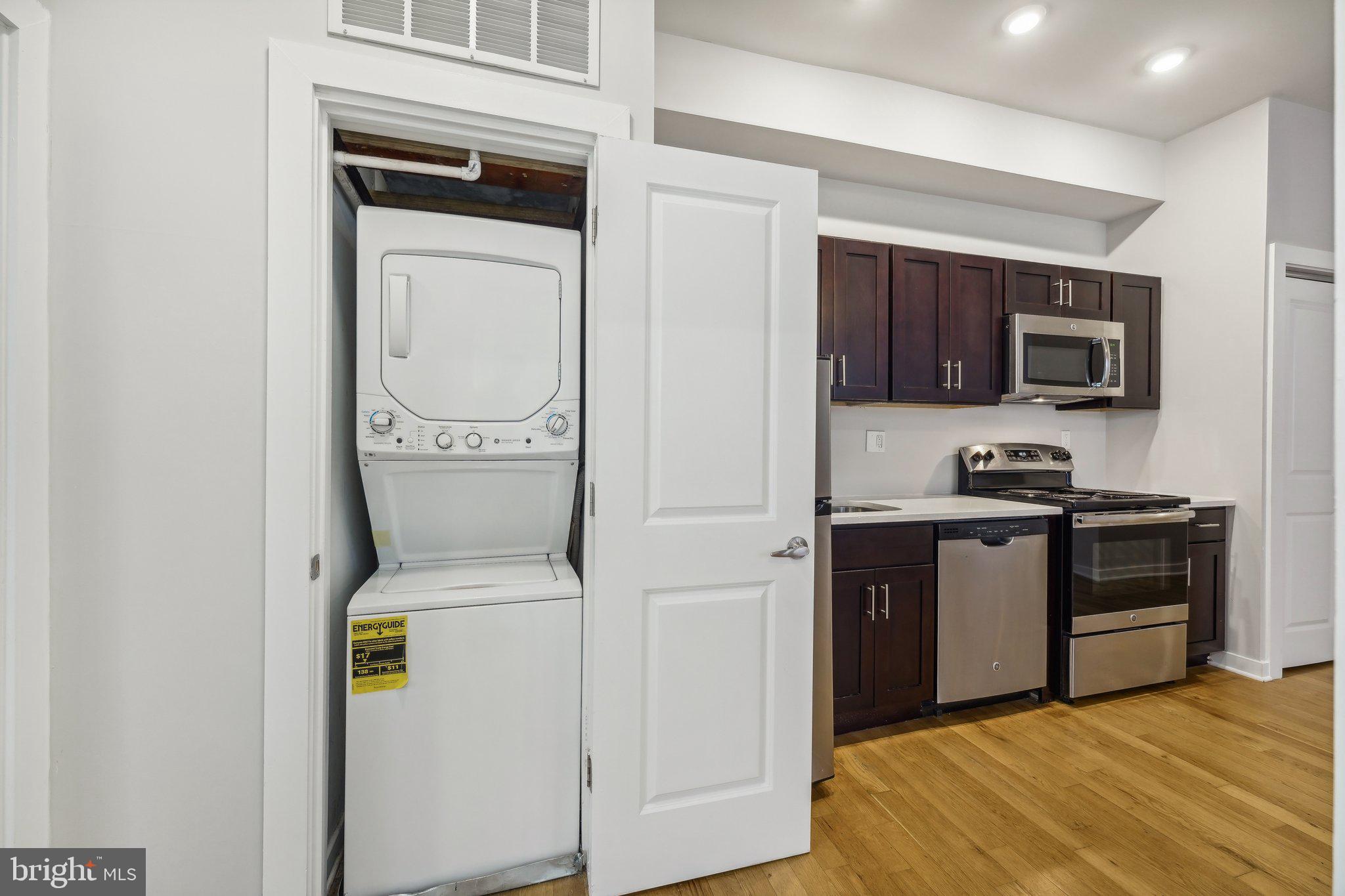 4300 Chestnut Street, Unit 2 Philadelphia, PA 19104 - Photo 9 of 30 a kitchen with a stove and a microwave