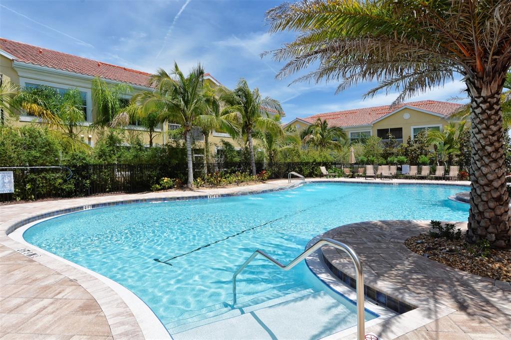 80 Navigation Circle Osprey, FL 34229 - Photo 26 of 36 a view of a garden with a lake