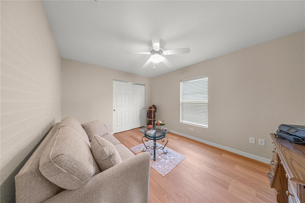 9175 Southeast 118th Loop Summerfield, FL 34491 - Photo 15 of 28 a living room with furniture and a window
