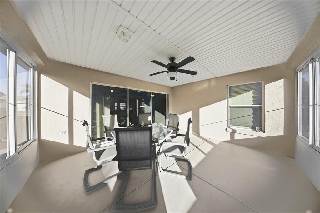 9175 Southeast 118th Loop Summerfield, FL 34491 - Photo 24 of 28 a view of a livingroom with furniture and large windows