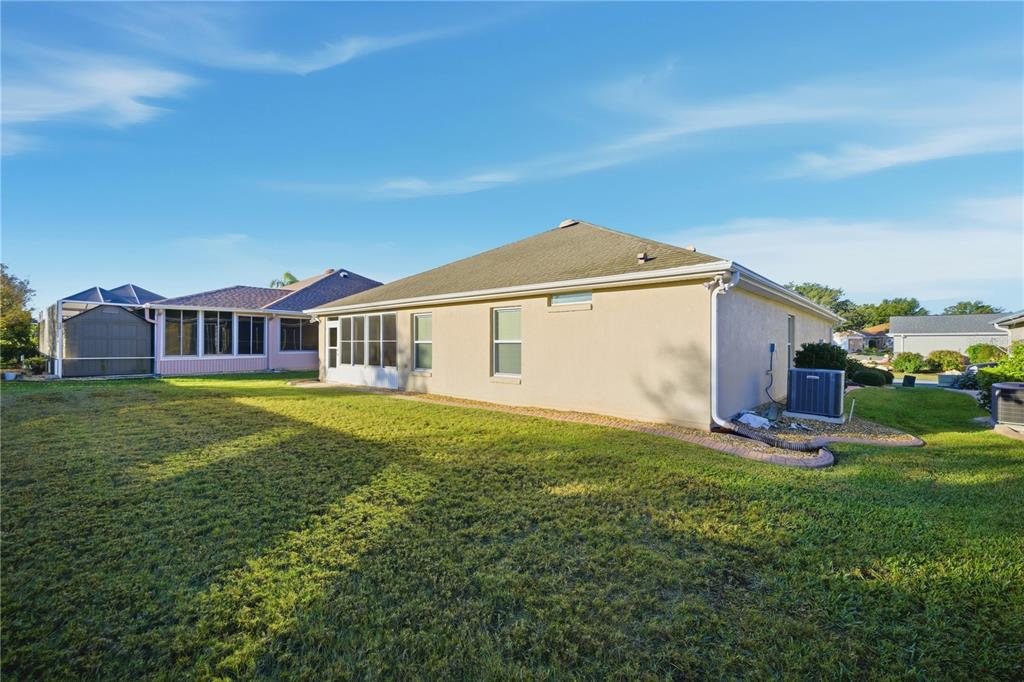 9175 Southeast 118th Loop Summerfield, FL 34491 - Photo 26 of 28 a view of a house with a yard