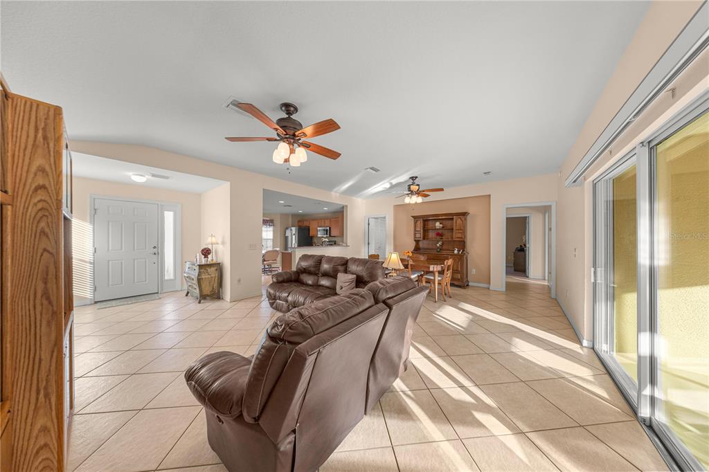 9175 Southeast 118th Loop Summerfield, FL 34491 - Photo 6 of 28 a view of a livingroom with furniture and a large window