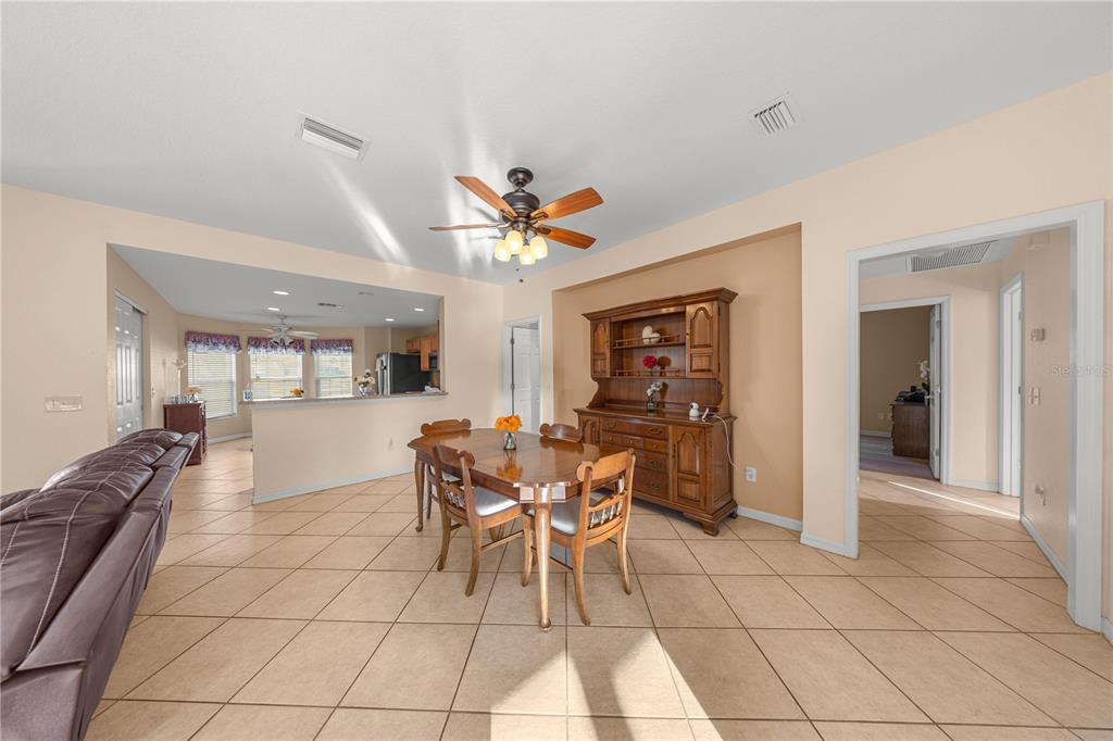 9175 Southeast 118th Loop Summerfield, FL 34491 - Photo 7 of 28 a dining room well furnished