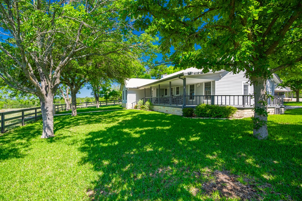 0 County Road Evant, TX 76525 - Photo 8 of 41 a view of a house with a big yard and large trees
